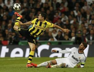 Dortmund hang on at Real to secure berth in final