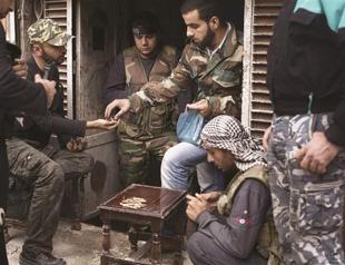 Hezbollah, rebels trade barbs over Syrian war