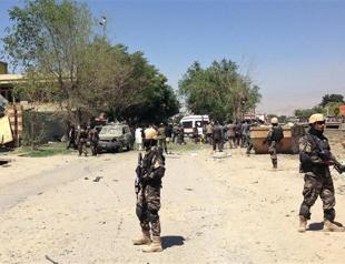 Karzai announces peace talks as Afghans take over security