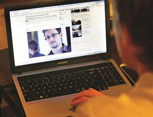 Defiant Snowden vows more leaks