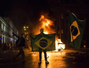 Rousseff salutes Brazil protests, cities cut bus fares