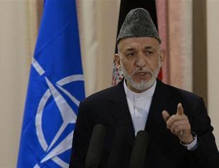 Karzai suspends US talks in row over Taliban office