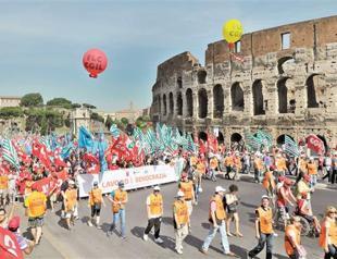 Tens of thousands rally in Rome against joblessness