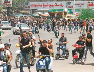 Fierce fighting rages in strategic Syrian town