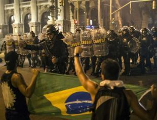 One killed as more than a million protest in Brazil
