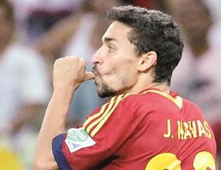 Navas shows steely nerves for Spain