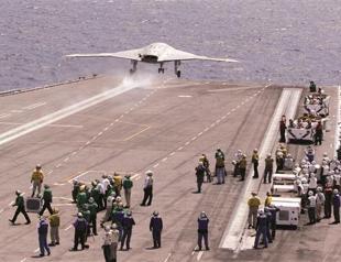 US drone makes historic landing on carrier deck