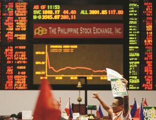 Global shares, bonds rally after US Fed cools tapering talk