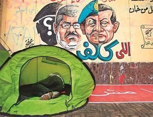 Egypts Morsi, opposition both defy army’s coup threat