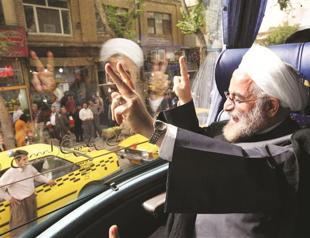 Iran’s Rouhani signals softer line on liberties