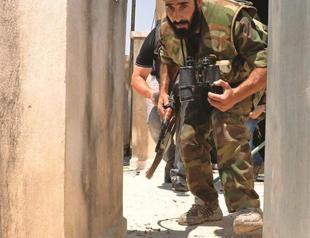 Army drops leaflets to Syria border town