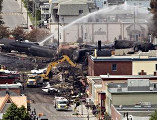 Railway blames firefighters in Canada train disaster