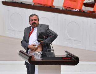 BDP deputy shows bruise on body in Parliament caused by tear gas canister during Gezi protests