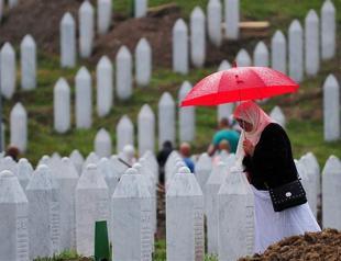Bosnians rebury 409 massacre victims on Srebrenica anniversary