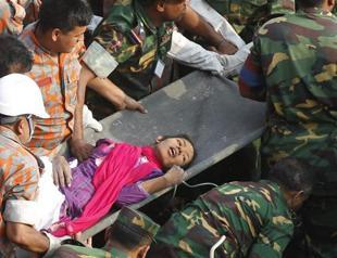 Woman rescued alive after 17 days as Bangladesh death toll passes 1,000