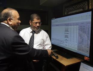 Egypt military confirms it is holding Morsi as deadly clashes leave at least 10 dead