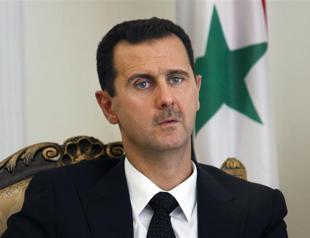Al-Assad praises Egyptian militarys overthrow of Mohamed Morsi