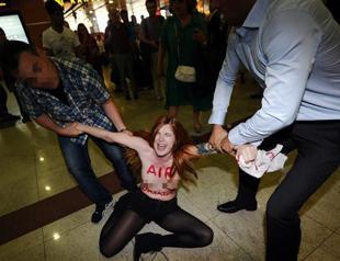 FEMEN topless activist protests Turkish PM