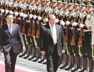 Pakistan, China bolster ties as key transport link deal inked