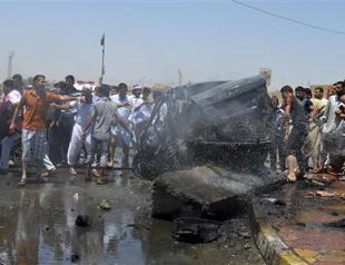 Iraq bomb attack on Shiite religious hall kills 15