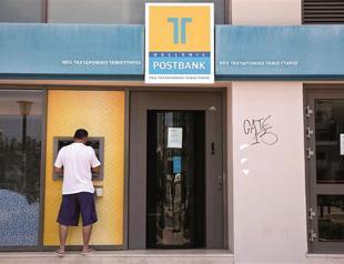 Greece picks Eurobank to buy Hellenic Postbank