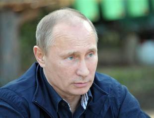 Putin accuses US of trapping Snowden in Russia