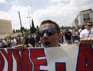 Greece nears deal for next tranche of EU-IMF funds