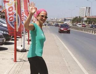 ‘Walking woman’ hits road against election threshold