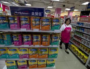 More firms cut baby formula prices amid China probe