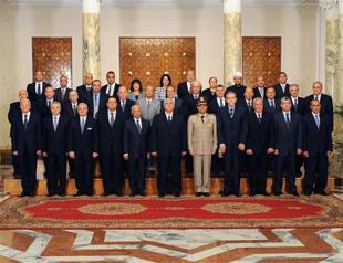 Egypt swears in first cabinet since Morsi ouster, army chief al-Sisi appointed deputy PM
