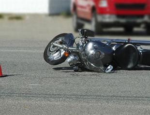 Curious details revealed in motorcycle accident, including long-range weapon and cash