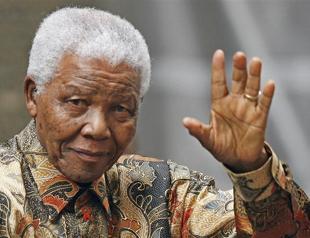 Mandela steadily improving as he turns 95 in hospital