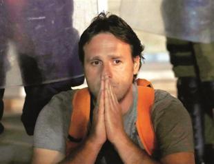 Athens approves public worker cuts