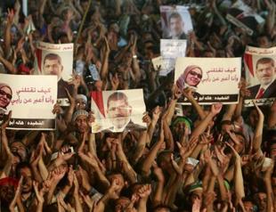 Morsi supporters defiant as scores killed in Egypt