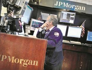 Under siege, JPMorgan to quit physical commodities