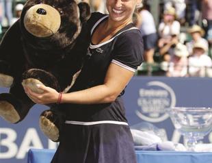 Cibulkova takes revenge on Radwanska on way to title