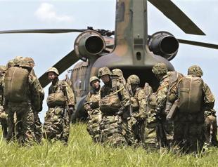 Japan eyeing Marines, drones in defense paper: Reports