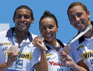 Swimming-Governing body FINA agrees to introduce mixed relays