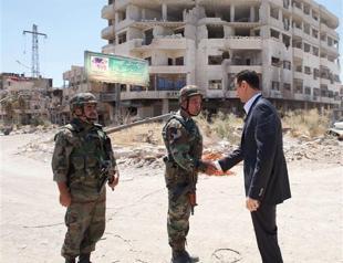 Assad visits ex-rebel bastion near capital