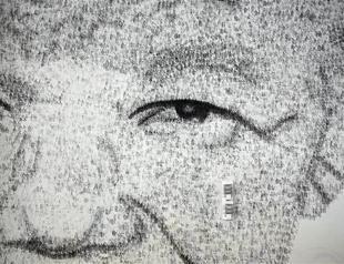 Mandelas freedom spirit punched onto Chinese wall