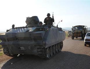 18 soldiers injured after fire was opened on army troops in village bordering Syria