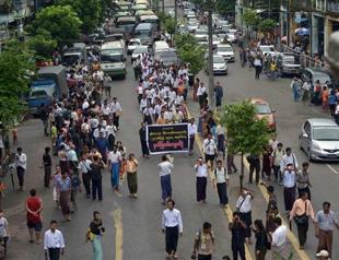 Thousands mark anniversary of Myanmar junta crackdown