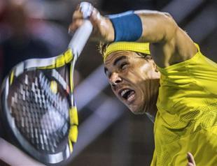 Nadal beats Djokovic to book Raonic title clash