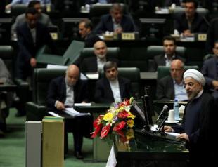 Rouhani defends cabinet choices as Iran parliament starts debate
