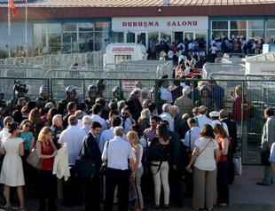 Ergenekon coup plot trial convict journalist Türkkan to stay in Germany