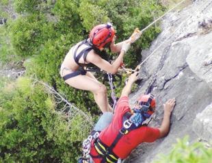 Search and rescue team saves young woman trapped on high cliffs for 11 hours after swimming
