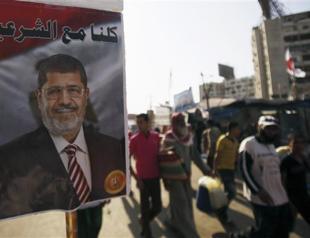 Egypts interim PM defends crackdown on Morsi supporters, slams anarchy