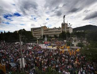 Greeks strike over state TV closure, PM offers talks