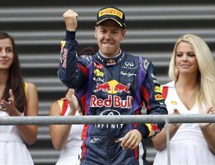Vettel storms to victory, extends lead in title race