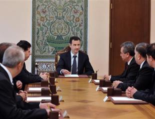 Assad says chemical weapons claims insult to common sense